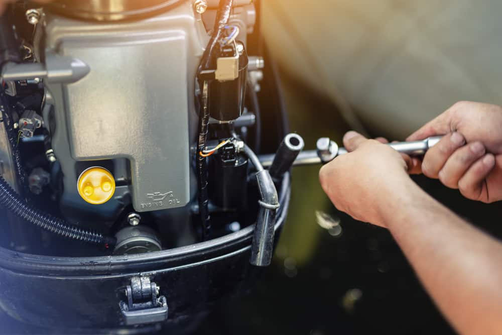 how to remove power trim from mercury outboard