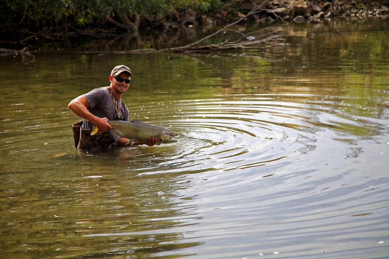 man wading river man wading river