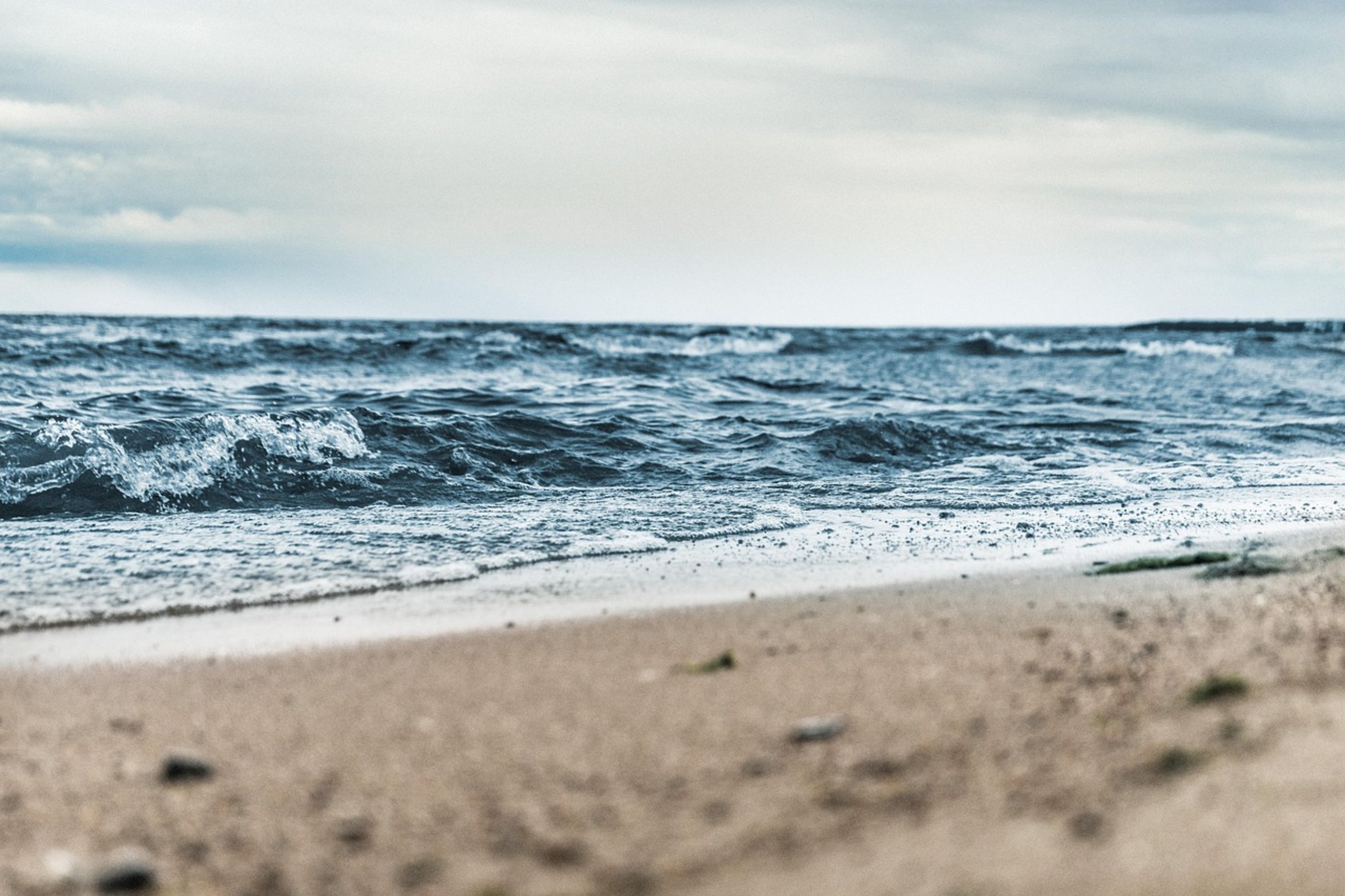 cloudy sky ocean surf cloudy sky ocean surf